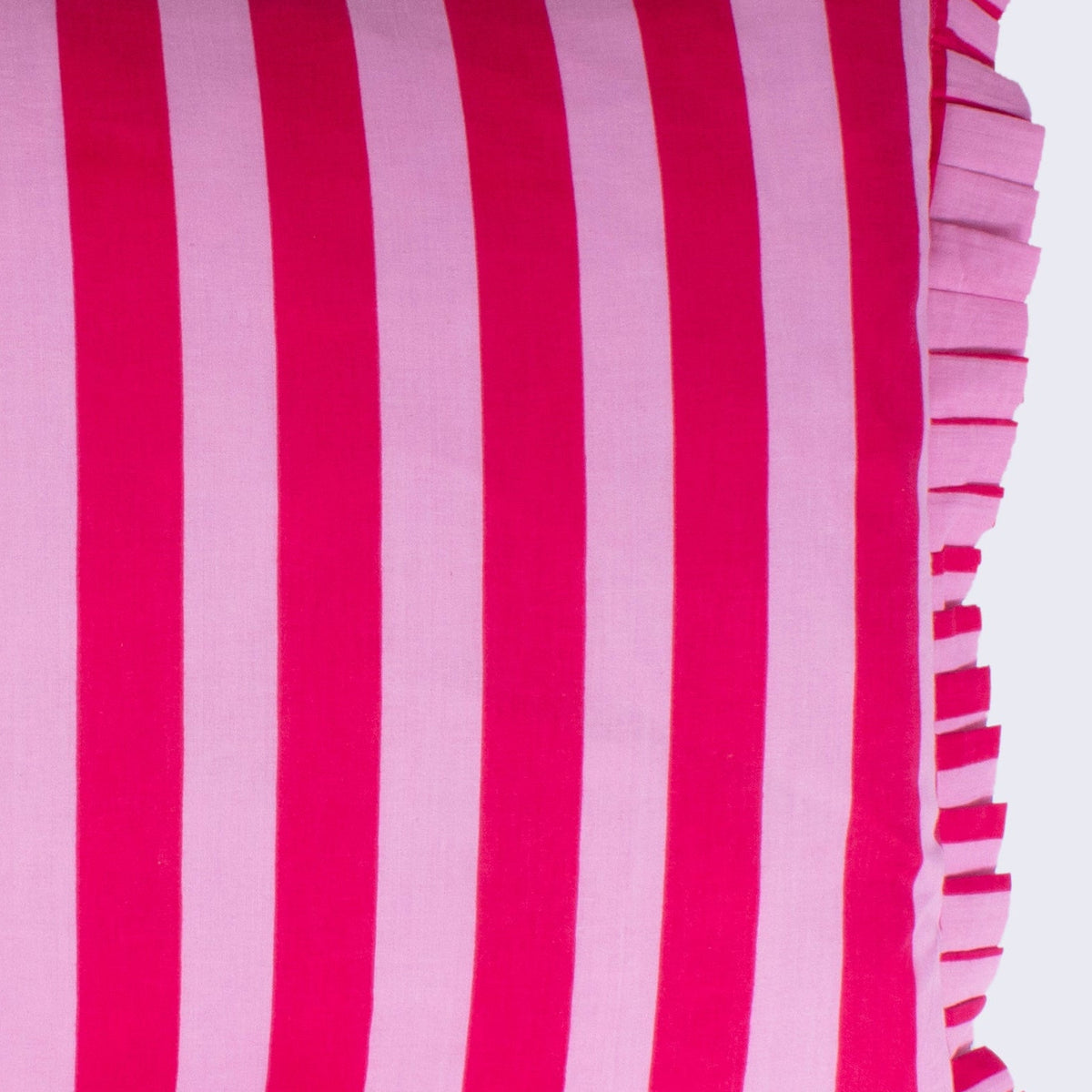Hand Block Print Striped Frilled Cushion with Feather Insert – Baby Pink & Cerise close-up detail showing bold vertical cerise and baby pink candy stripe hand block print on cotton with the matching cerise and baby pink pleated knife-pleat frill edge