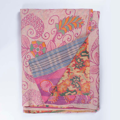 Handcrafted Vintage Kantha Quilt – Fluid Leaf & Paisley Twirls folded, showing both reversible sides – fluid leaf side and dynamic paisley twirl reverse